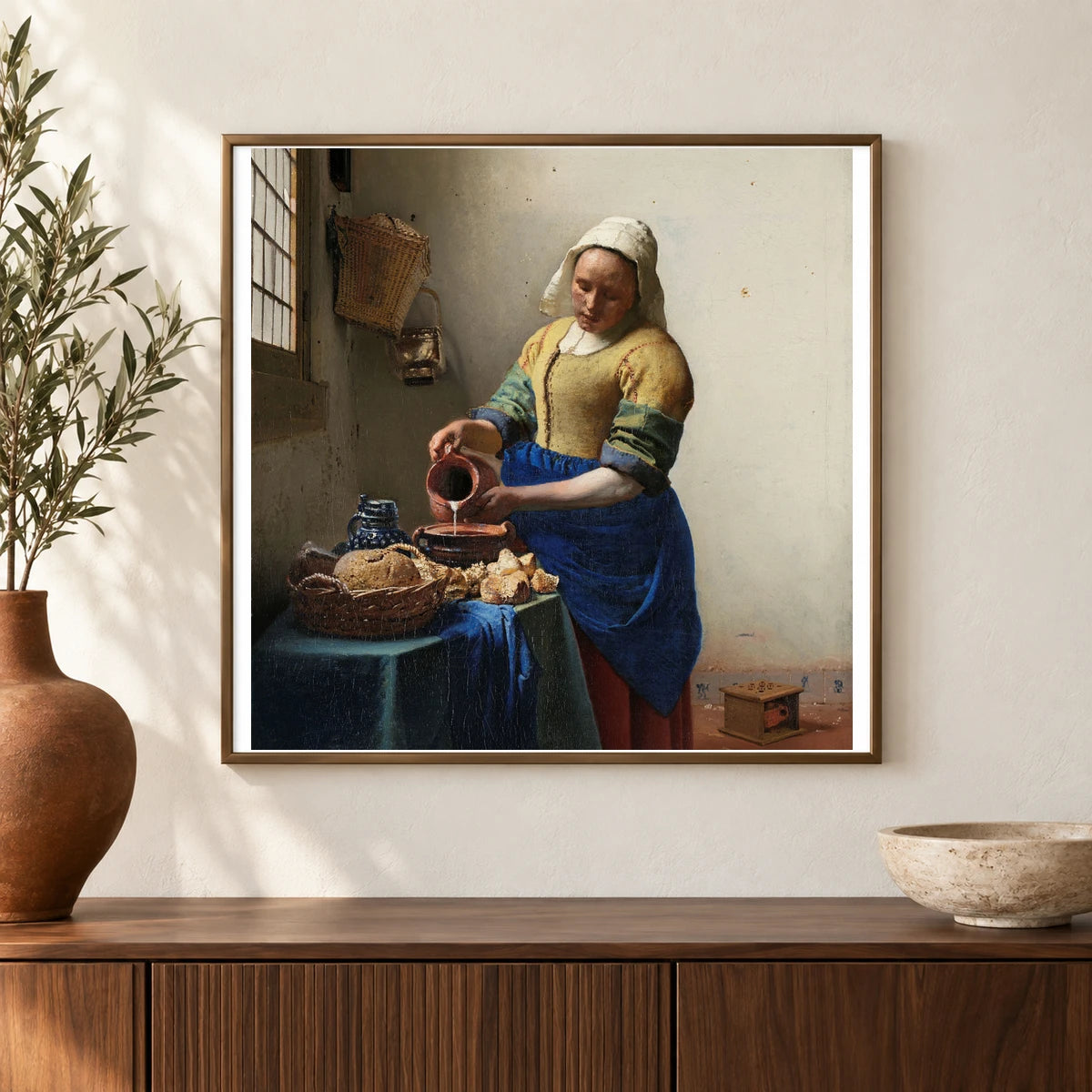 The Milkmaid (c. 1660) — Johannes Vermeer shown in a styled interior