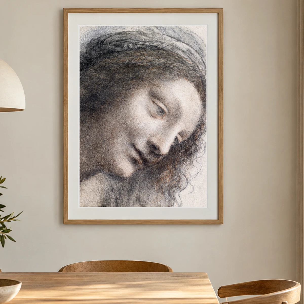 The Head Of The Virgin In Three Quarter View Facing Right (ca. 1510–1513) By Leonardo Da Vinci — Classical Art shown in a styled interior