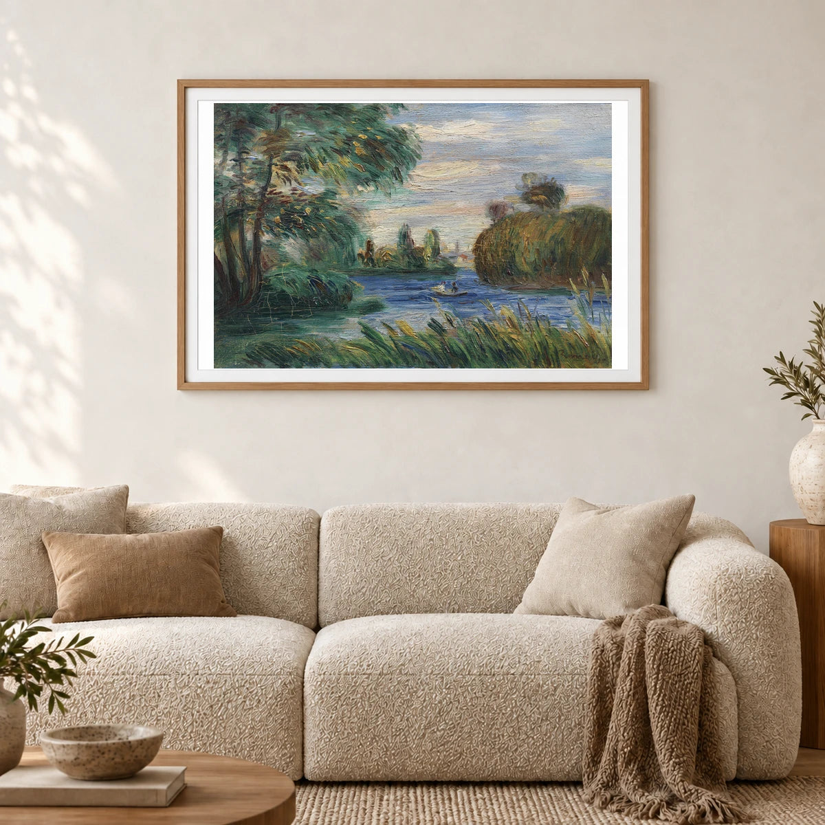 River Landscape (c.1890) — Pierre-Auguste Renoir shown in a styled interior