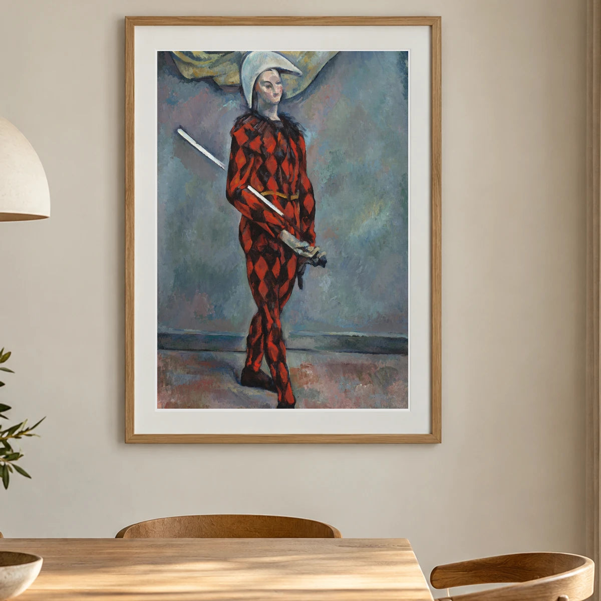 Harlequin (1888 1890) — Paul Cézanne shown in a styled interior