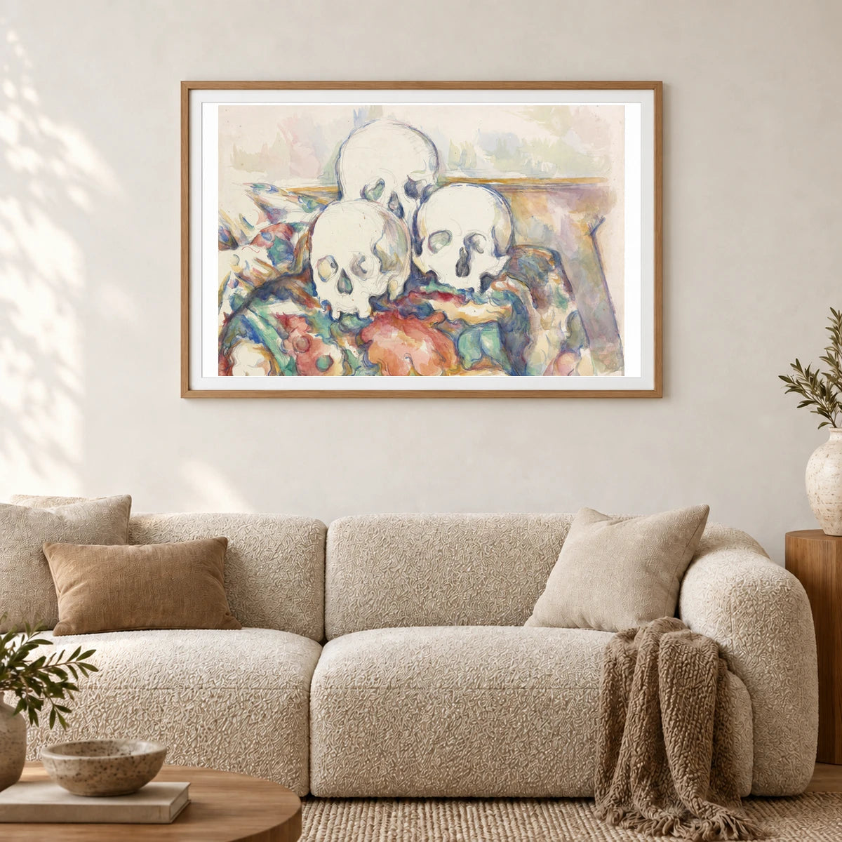 The Three Skulls (1902–1906) — Paul Cézanne shown in a styled interior