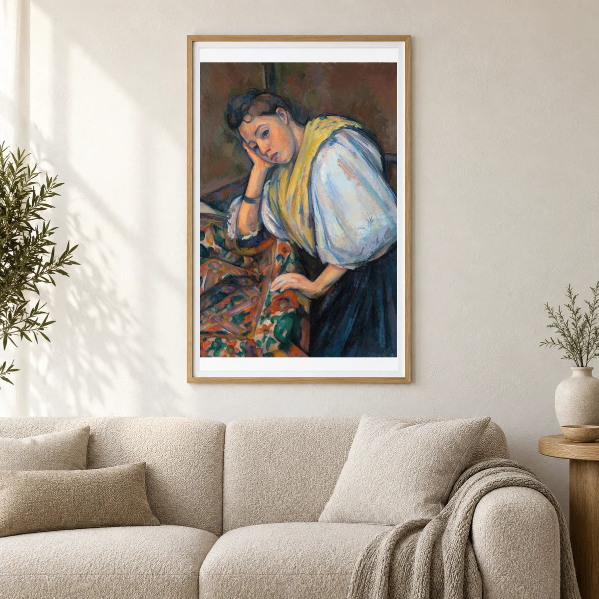 Young Italian Woman At A Table (1895–1900) — Paul Cézanne shown in a styled interior