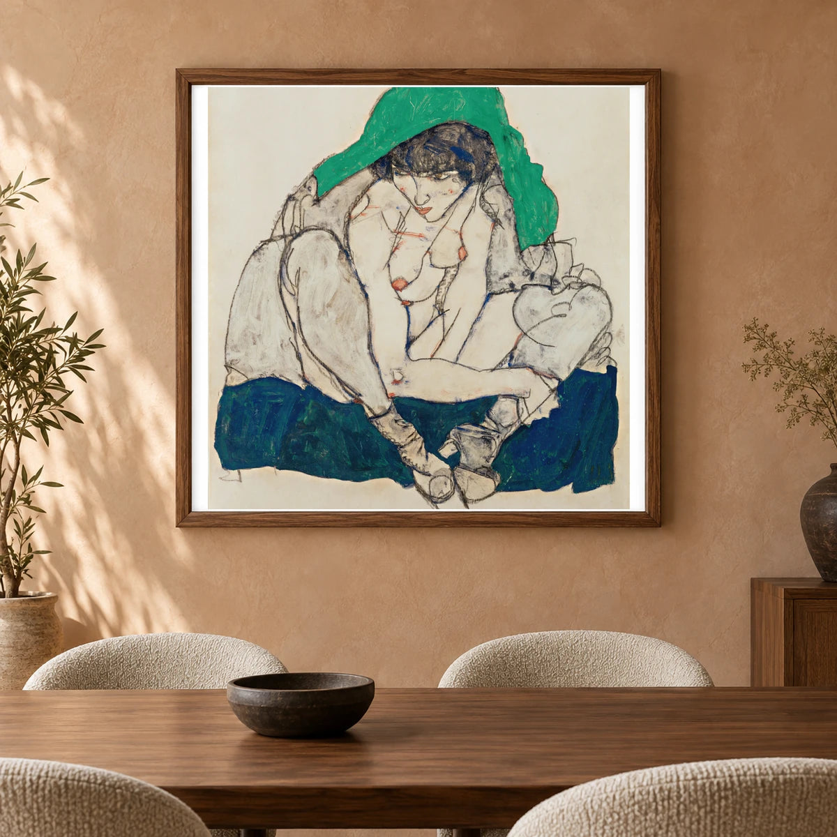 Crouching Woman With Green Headscarf (1914) — Egon Schiele shown in a styled interior