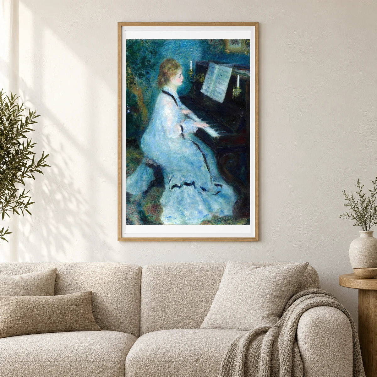 Woman At The Piano — Pierre-Auguste Renoir shown in a styled interior