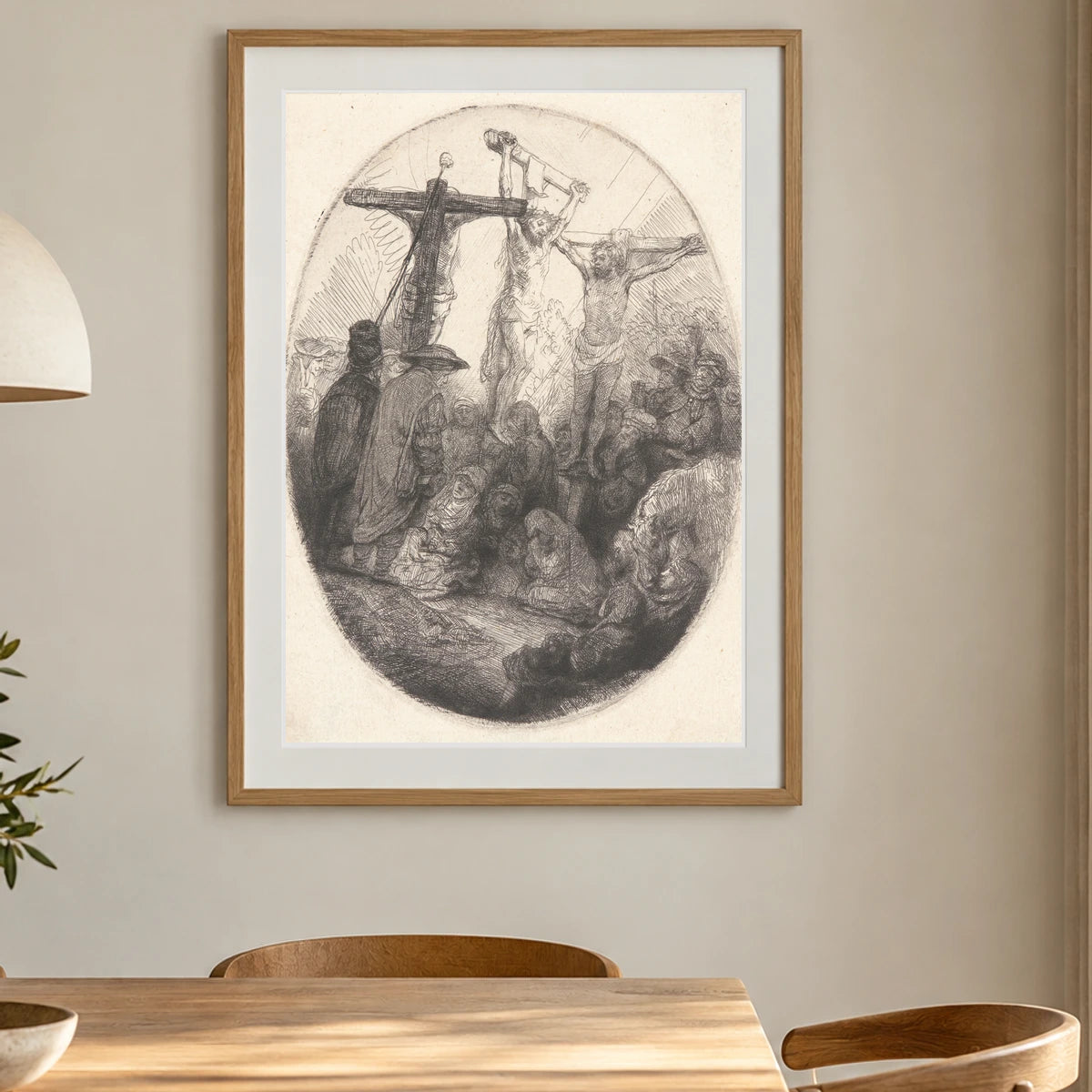 Christ Crucified Between The Two Thieves (ca. 1641) — Rembrandt van Rijn shown in a styled interior