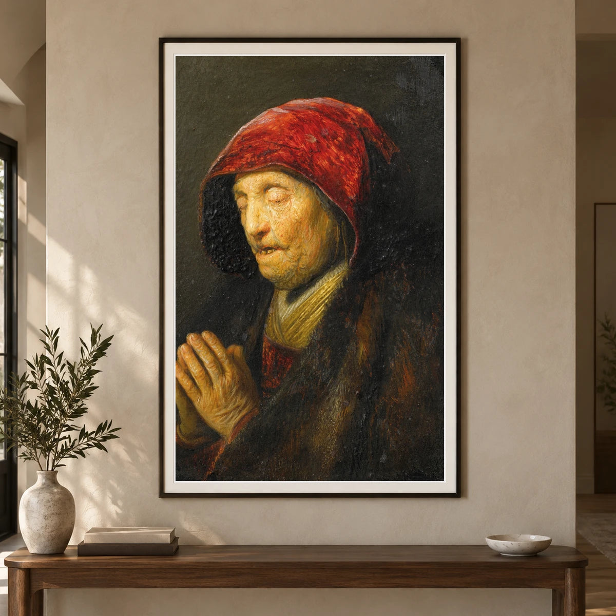 Old Woman Praying (1629 1630) — Rembrandt van Rijn shown in a styled interior