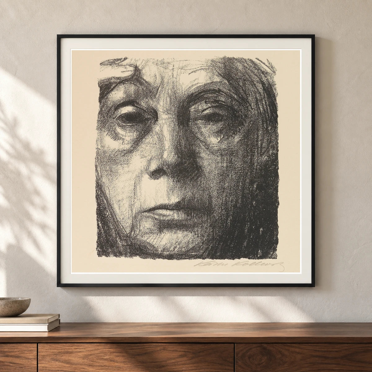 Selbstbildnis (1934) — Käthe Kollwitz shown in a styled interior